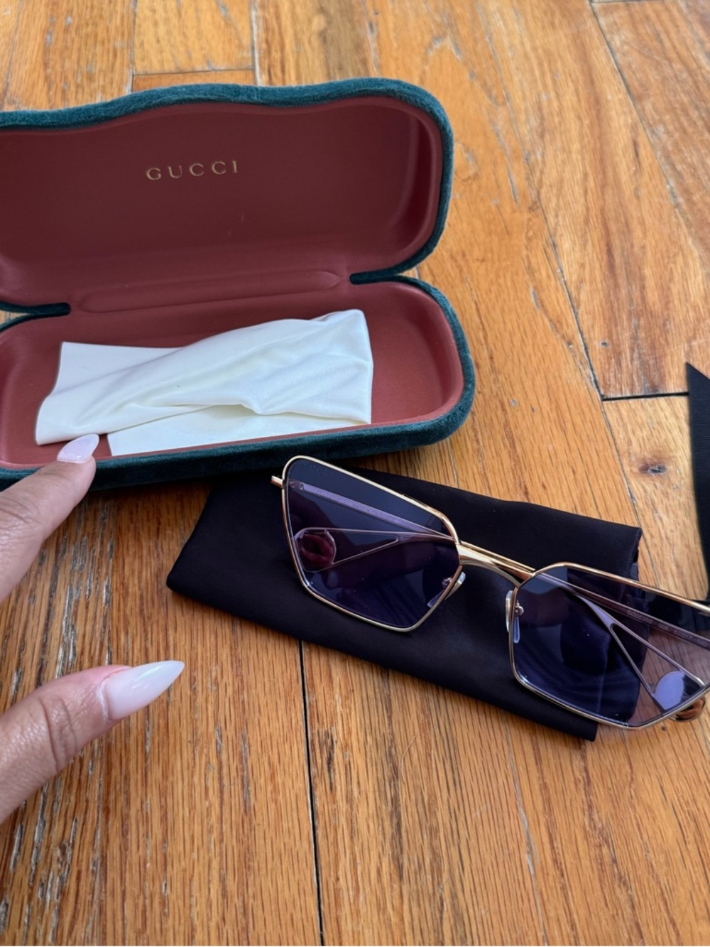 Gucci Gold Frame Sunglasses with Dark Purple Lenses
